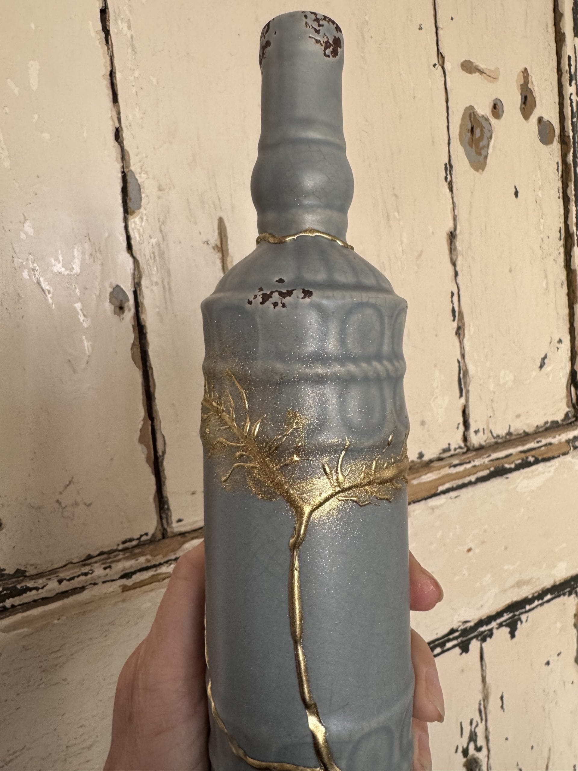 Kintsugi urn met gouden lijnen als levensboom Kintsugi urn met gouden lijnen als levensboom